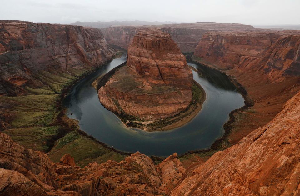 The Colorado River wraps around Horseshoe Bend in the in Glen Canyon National Recreation Area in Page, Arizona, on Feb. 11, 2017.  / Credit: RHONA WISE/AFP via Getty Images