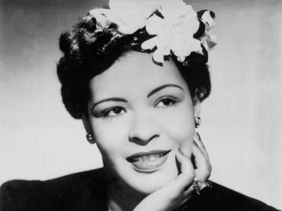 CIRCA 1939: Jazz singer Billie Holiday poses for a portrait in circa 1939 with a flower in her hair. (Photo by Michael Ochs Archives/Getty Images)
