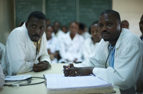 <span class="caption">Many doctors and healthcare staff feel the need to practice in richer countries that offer a more stable politics, better education and opportunities for their families.</span> <span class="attribution"><a class="link " href="https://commons.wikimedia.org/wiki/File:Pediatric_doctors_at_Donka_hospital_reviewing_mealses_cases.jpg" rel="nofollow noopener" target="_blank" data-ylk="slk:Julien Harneis;elm:context_link;itc:0;sec:content-canvas">Julien Harneis</a>, <a class="link " href="http://creativecommons.org/licenses/by-sa/4.0/" rel="nofollow noopener" target="_blank" data-ylk="slk:CC BY-SA;elm:context_link;itc:0;sec:content-canvas">CC BY-SA</a></span>