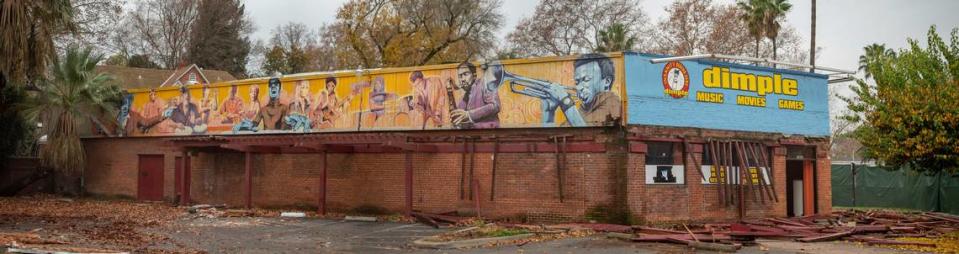 The building at Land Park Drive and Broadway that was once part of the heart of Tower Records international music franchise and, more recently, local music retailer Dimple Records, is prepared for demolition in 2019.