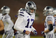 Kansas State quarterback Nick Ast (17) walks off the field after a Kansas State fumble during the second half of an NCAA college football game against Iowa State, Saturday, Nov. 21, 2020, in Ames, Iowa. Iowa State won 45-0. (AP Photo/Charlie Neibergall)