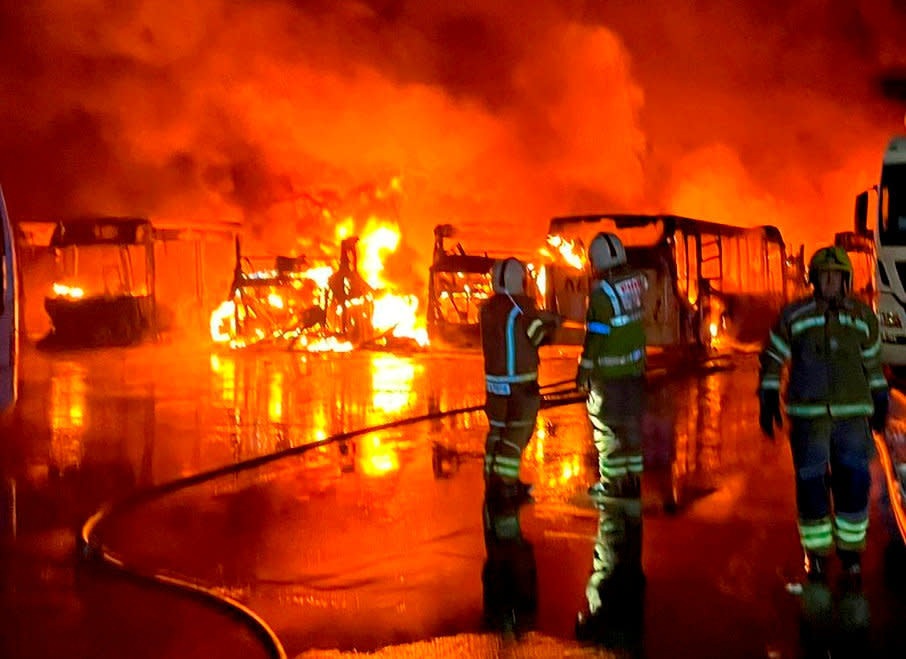 The huge fire at Kev’s Cars and Coaches in Bromsgrove. (SWNS)