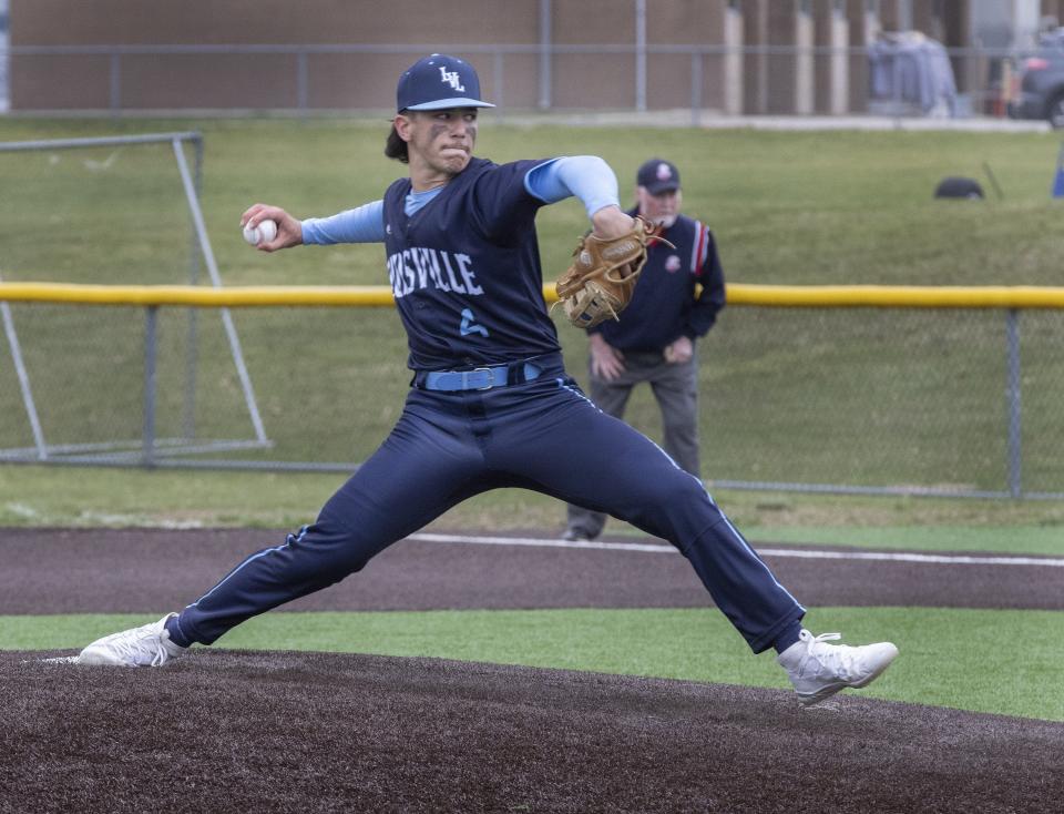 Louisville starting pitcher Anthony Warner delivers a pitch during a game against Central Catholic on Tuesday, April 5, 2022.