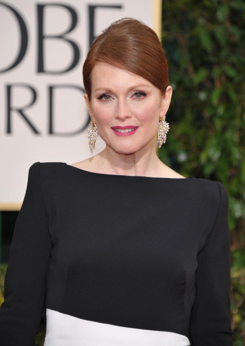Actress Julianne Moore arrives at the 70th Annual Golden Globe Awards at the Beverly Hilton Hotel on Sunday Jan. 13, 2013, in Beverly Hills, Calif. (Photo by John Shearer/Invision/AP)
