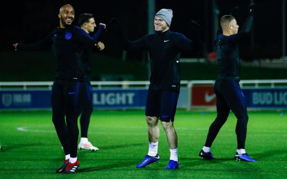 Wayne Rooney joins his England teammates at training - REX