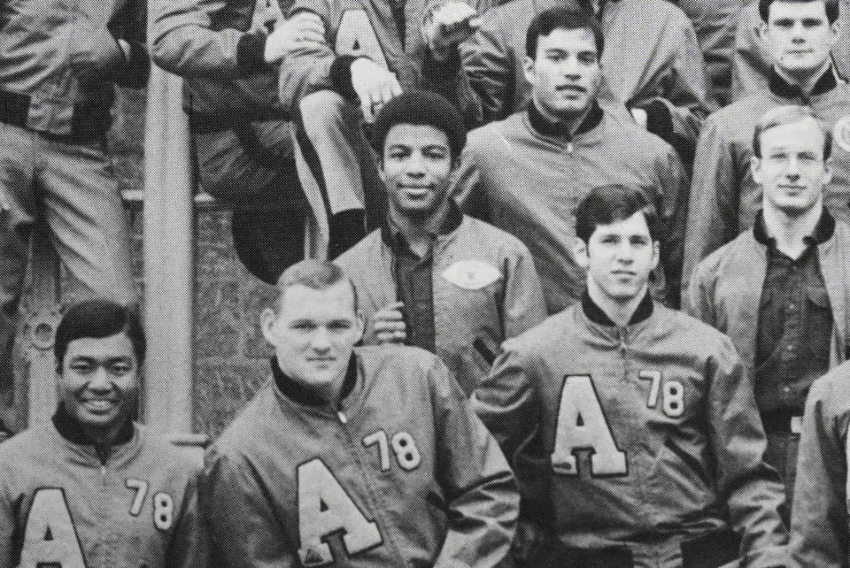 Curtis Harris, center, is shown in this photo of Company A-2, from the 1978 "Howitzer" yearbook of the U.S. Military Academy at West Point, N.Y. West Point remains a point of pride for Harris, who hasn’t missed an Army-Navy football game in 40 years. He visits high schools and junior high schools to encourage candidates of diverse backgrounds to apply. (U.S. Military Academy photo via AP)