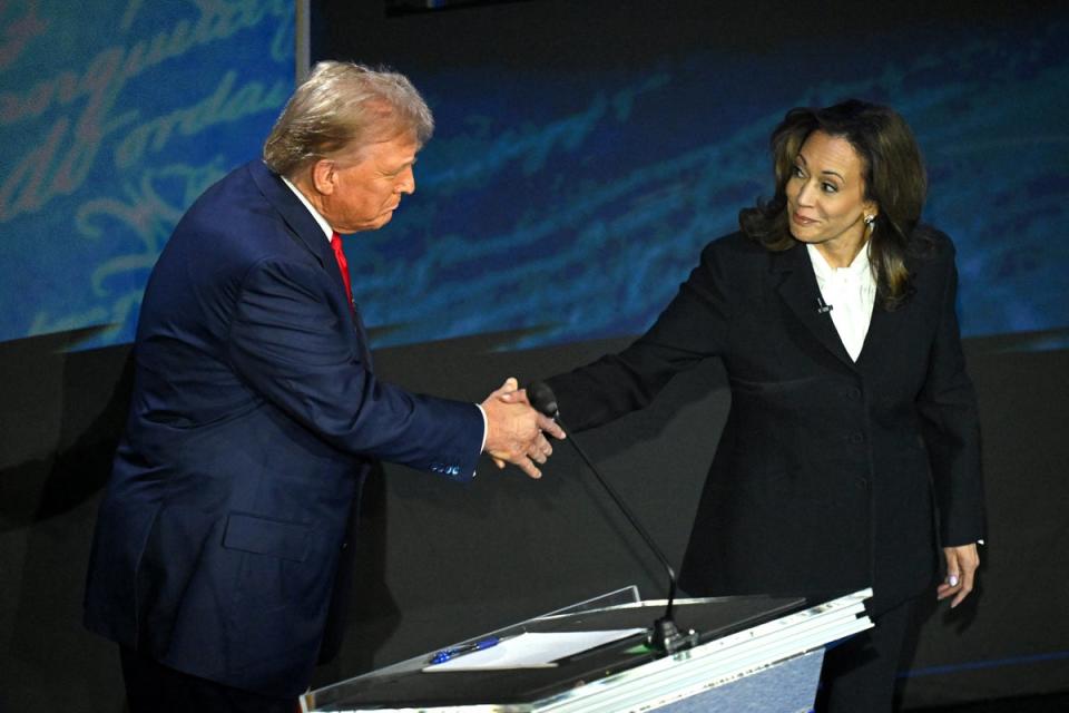 Kamala Harris shakes hands with Donald Trump before the debate on September 10 in Philadelphia (AFP via Getty Images)