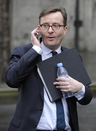 Sky's head of news Ryley leaves the High Court after appearing before the Leveson Inquiry in London