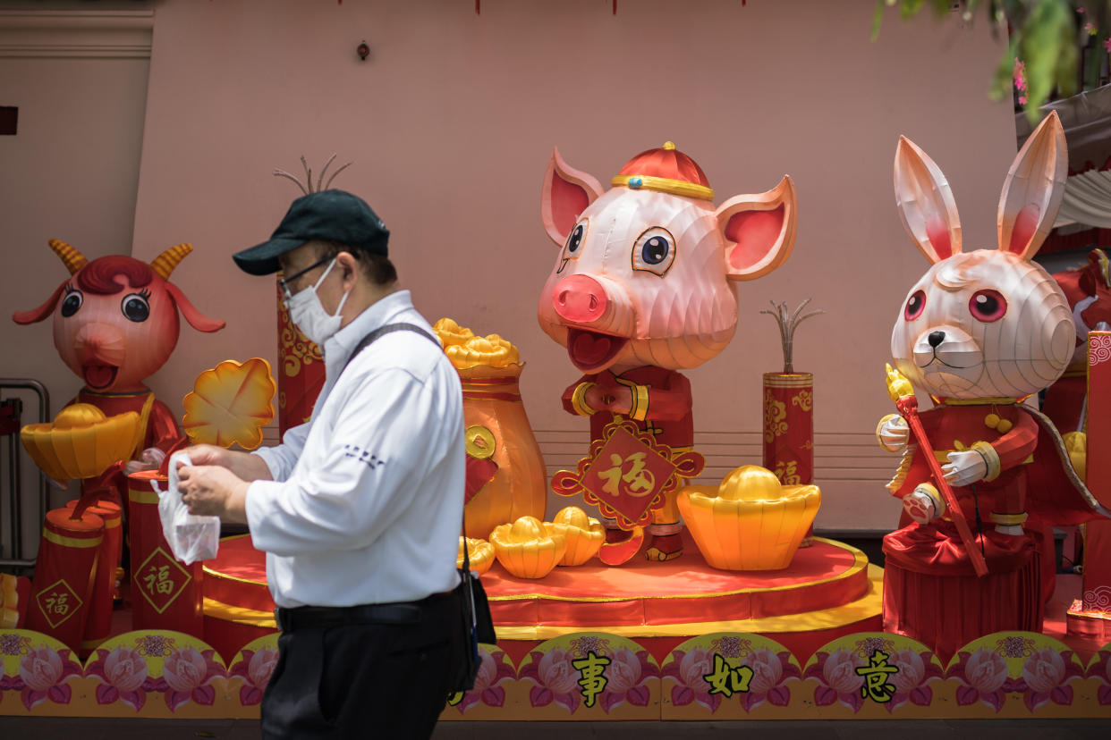 A man wearing a protective face mask at Chinatown in Singapore on 19 February, 2020. (PHOTO: Barcroft Media via Getty Images)