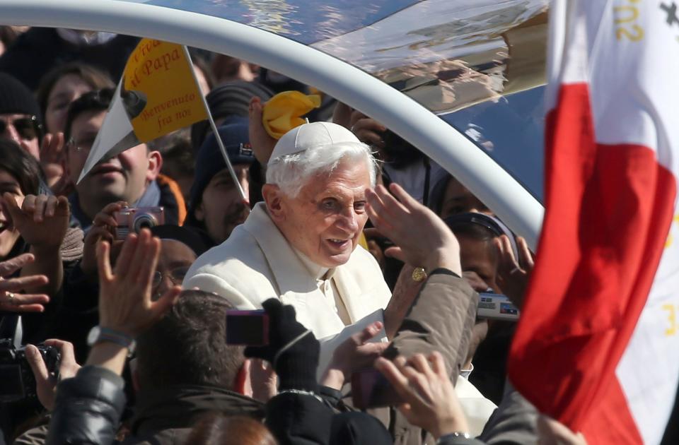 Pope Benedict XVI waves to the faithful in St. Peter's Square for his final general audience on Feb. 27, 2013, in Vatican City, Vatican.