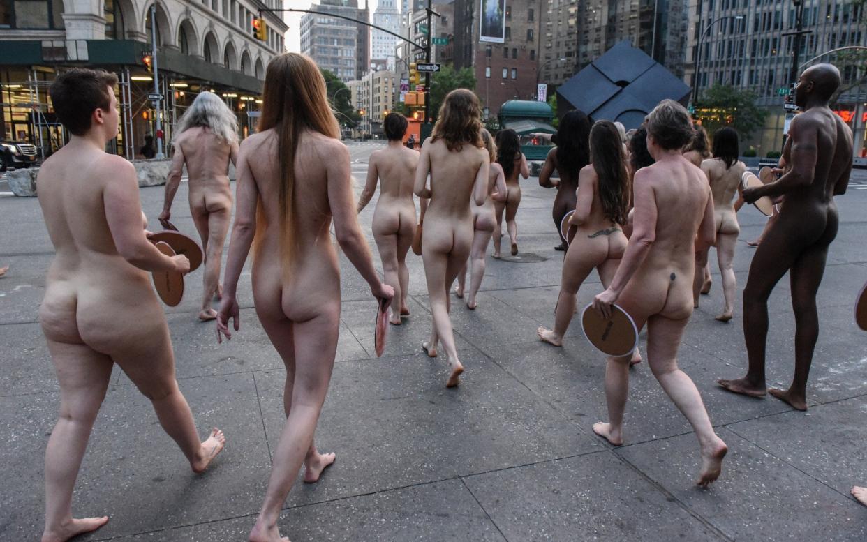 Demonstrators in New York protesting Facebook's policies on nipples - Getty Images North America