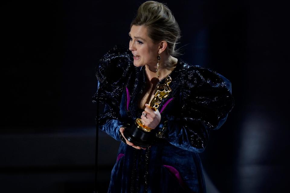 Holly Waddington accepts the award for achievement in costume design for "Poor Things" during the 96th Oscars at the Dolby Theatre at Ovation Hollywood in Los Angeles on March 10, 2024.