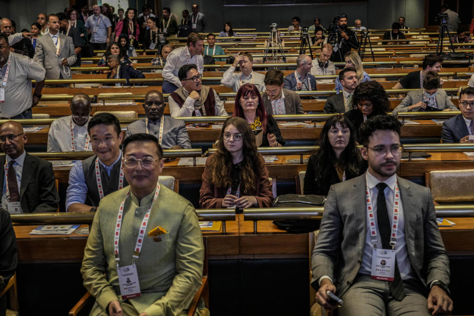 Delegates from the Group of 20 nations attend a tourism meeting in Srinagar, Indian controlled Kashmir, Monday, May 22, 2023. The meeting condemned by China and Pakistan is the first significant international event in Kashmir since New Delhi stripped the Muslim-majority region of semi-autonomy in 2019. (AP Photo/Mukhtar Khan)