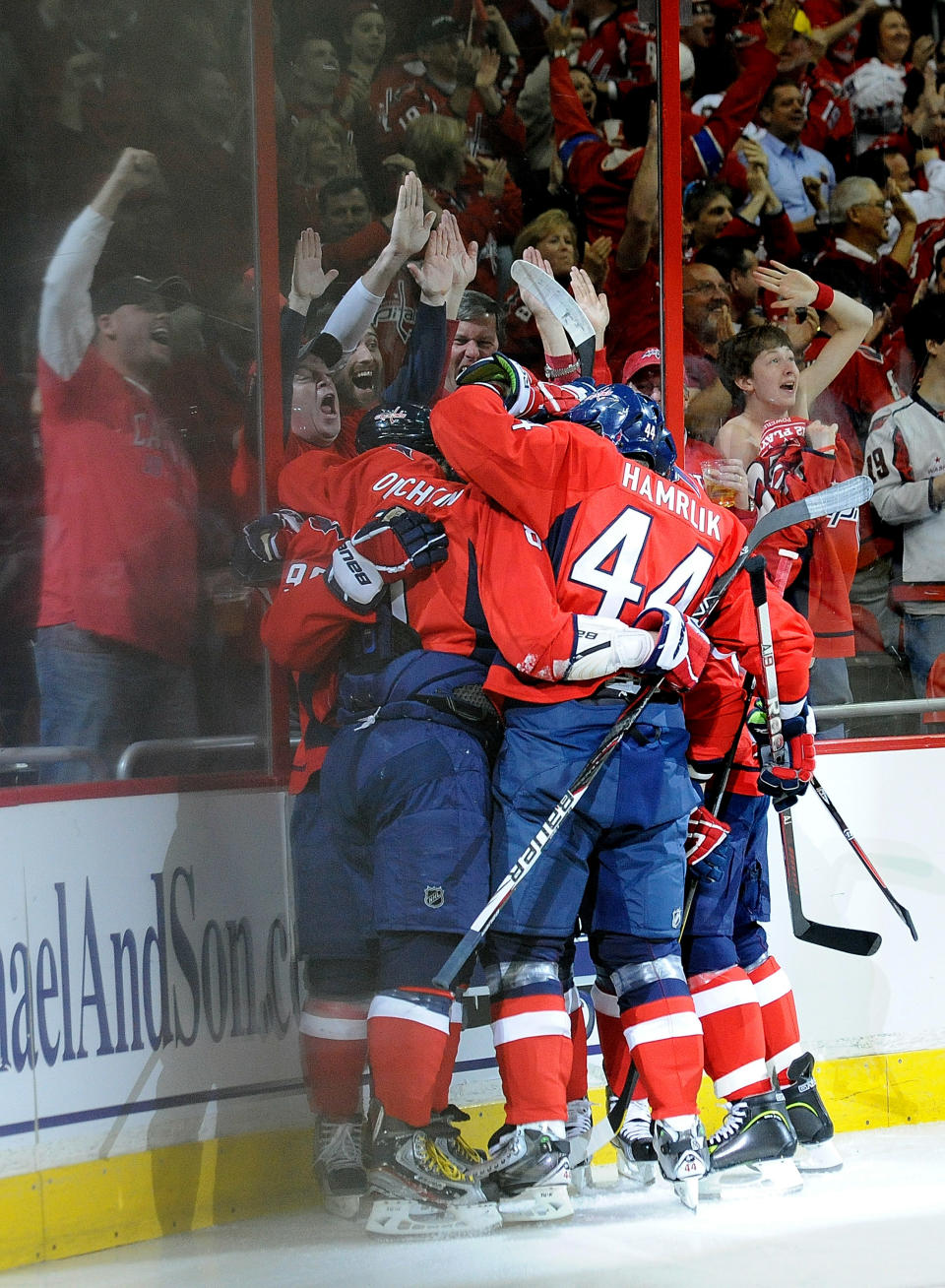 WASHINGTON, DC - APRIL 19: Marcus Johansson #90 of the Washington Capitals celebrates with his teammates after scoring a goal against the Boston Bruins in Game Four of the Eastern Conference Quarterfinals during the 2012 NHL Stanley Cup Playoffs at Verizon Center on April 19, 2012 in Washington, DC. (Photo by Patrick McDermott/Getty Images)