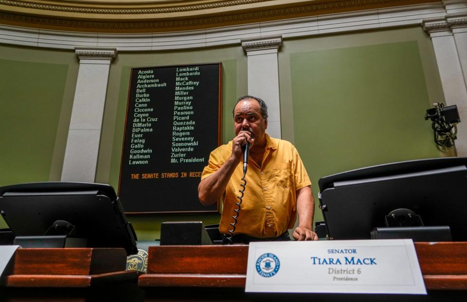 Capitol TV technician Dan Alves tests all the microphones on the Senate side Thursday in preparation for the final General Assembly session.