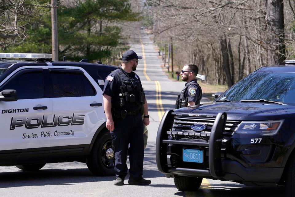 Police stand guard in Dighton (AP)