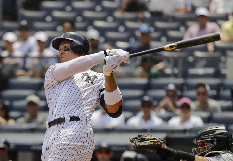 New York Yankees' Aaron Judge follows through on a RBI double during the first inning of a baseball game against the Colorado Rockies Saturday, July 20, 2019, in New York. (AP Photo/Frank Franklin II)