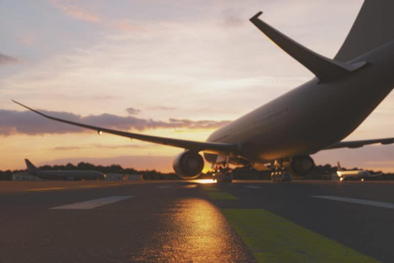 A airplane sits on a runway.