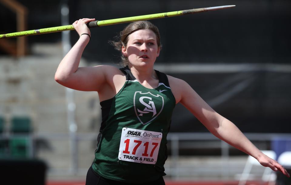 Annabelle Brawley from Salem Academy competes in the 2A girls javelin on her way to second place during the Oregon State Track and Field Championships Thursday at Hayward Field in Eugene, Oregon.