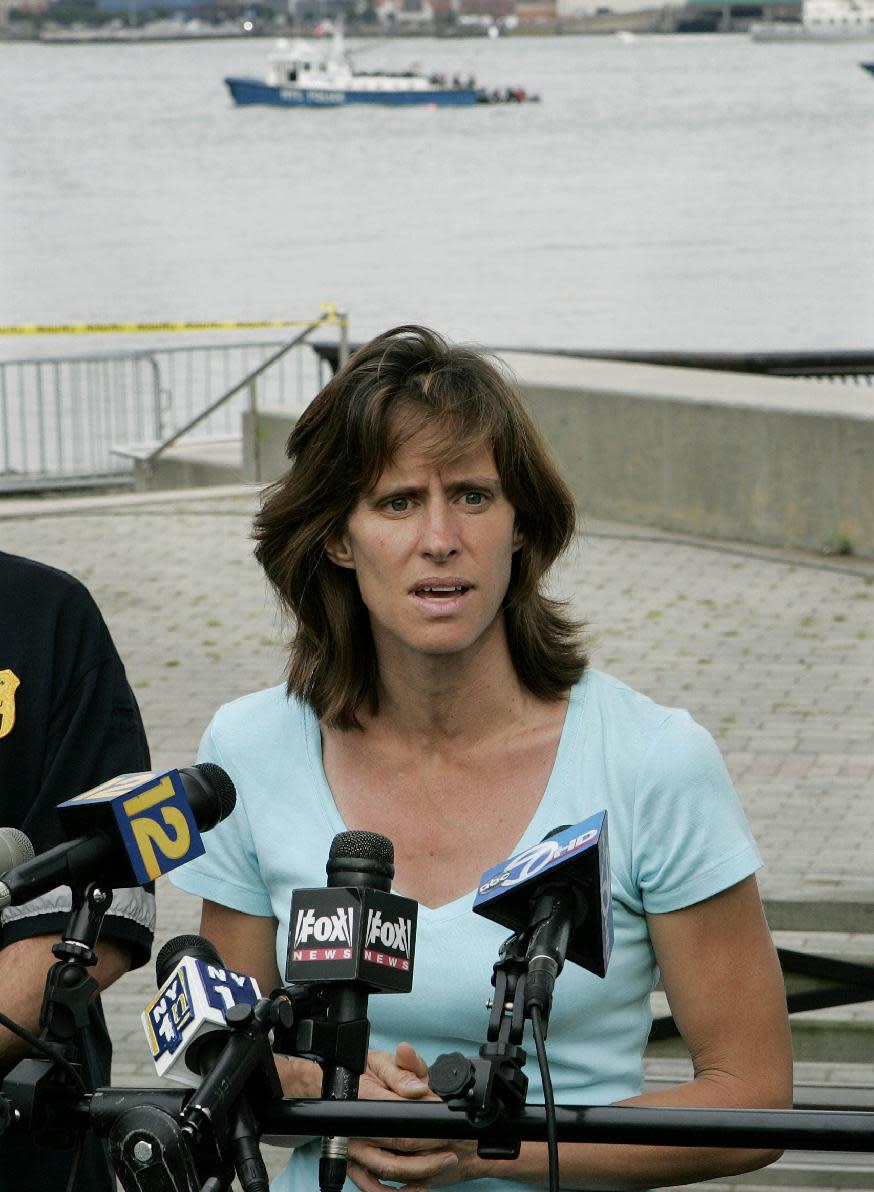 FILE - In this Saturday, Aug. 8, 2009 file photograph, Hoboken Mayor, Dawn Zimmer speaks to the media as she stands near the Hudson River in Hoboken, N.J. Zimmer, mayor of a New Jersey city that sustained severe flooding from Hurricane Sandy claims the Christie administration withheld millions of dollars in recovery grants because she refused to sign off on a politically connected development. MSNBC first reported her comments Saturday. (AP Photo/Mel Evans,file)