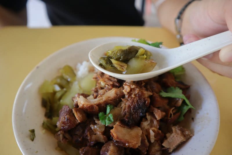 tea inn bak kut teh - pickled mustard greens closeup