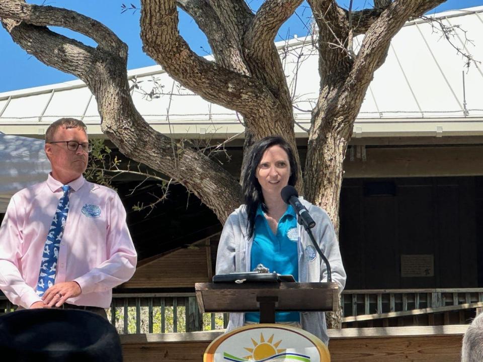 Tracy Dawson, manager of the Marine Science Center's bird rehabilitation hospital, speaks during the center's Raptor Education and Conservation Exhibit groundbreaking ceremony, Monday, March 20, 2023.