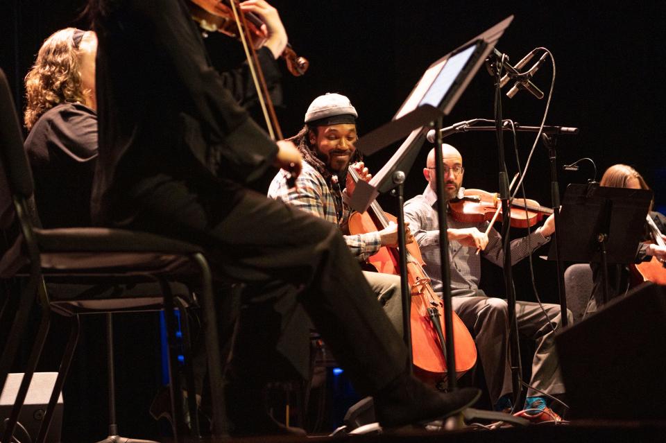 Cellist Jordan Hamilton performs The Beatles' "Blackbird" with the Battle Creek Symphony's string quartet during the Art Bash event at W.K. Kellogg Auditorium on Thursday, March 21, 2024.