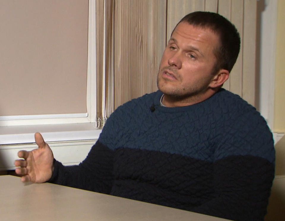 FILE - In this Thursday, Sept. 13, 2018 video grab file image provided by the RT channel on Thursday, Sept. 13, 2018, a man identified as Alexander Petrov attends his first public appearance in an interview with the RT channel in Moscow, Russia. Investigative group Bellingcat reported Monday Oct. 8, 2018 on its website that the man British authorities identified as Alexander Petrov is actually Alexander Mishkin, a doctor working for the Russian military intelligence unit known as GRU. The other suspect in the March nerve agent attack on Sergei Skripal and his daughter in Salisbury, England, — Ruslan Boshirov. — is a decorated Russian agent named Anatoliy Chepiga, Bellingcat reported last month. (RT channel video via AP, File)