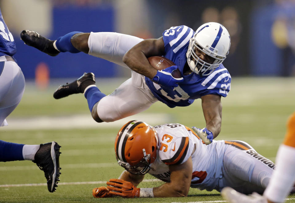 <p>Indianapolis Colts running back Frank Gore (23) goes over Cleveland Browns middle linebacker Joe Schobert (53) during the first half of an NFL football game in Indianapolis, Sunday, Sept. 24, 2017. (AP Photo/AJ Mast) </p>