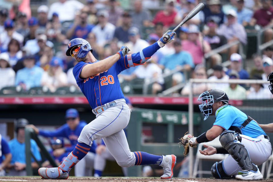 New York Mets' Pete Alonso (20) strikes out during the first inning of a spring training baseball game against the Miami Marlins, Saturday, March 4, 2023, in Jupiter, Fla. (AP Photo/Lynne Sladky)
