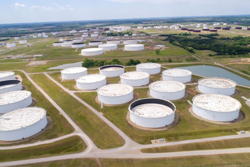 FILE PHOTO: Crude oil storage tanks are seen in an aerial photograph at the Cushing oil hub