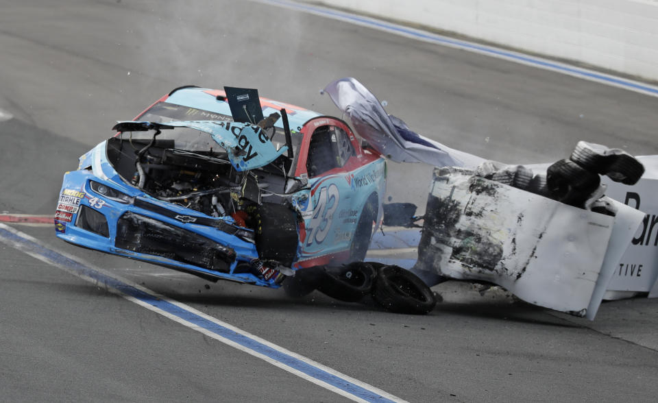 Bubba Wallace crashes in Turn 12 during practice for Sunday's NASCAR Cup Series auto race at Charlotte Motor Speedway in Concord, N.C., Saturday, Sept. 29, 2018. (AP Photo/Chuck Burton)