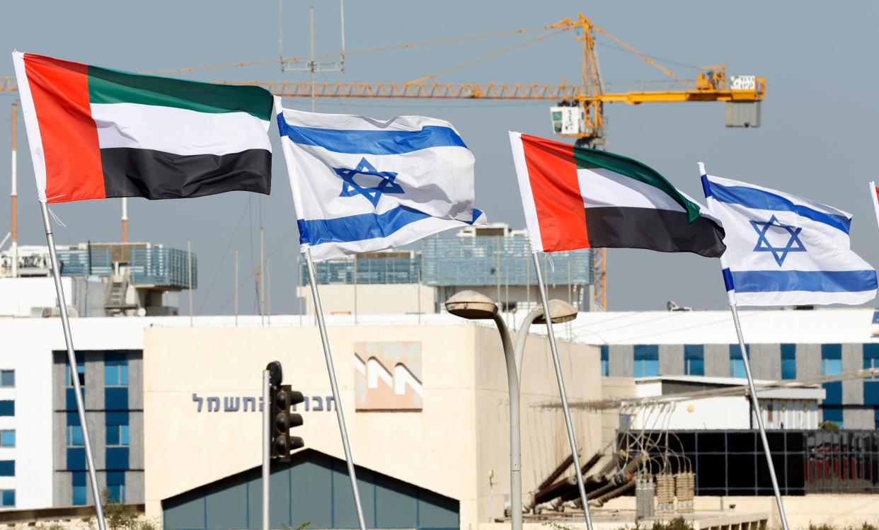 Israeli and United Arab Emirates flags line a road in the Israeli coastal city of Netanya, on August 16, 2020. Photo: Jack Guez / AFP via Getty Images