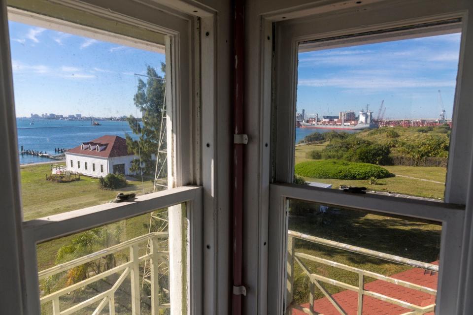 A view from of the Coast Guard boathouse and Port of Palm Beach from the watchtower in the top of the former Coast Guard station on Peanut Island Monday November 25, 2019.  The Coast Guard station, along and boathouse, along with the Cold War-era John F. Kennedy bunker, are closed to the public while efforts are ongoing to refurbish them.  The bunker was built in 1961 as a top-secret nuclear bomb shelter for President Kennedy in case of an attack while he was visiting his "winter White House" on the north end of Palm Beach.   [LANNIS WATERS/palmbeachpost.com]