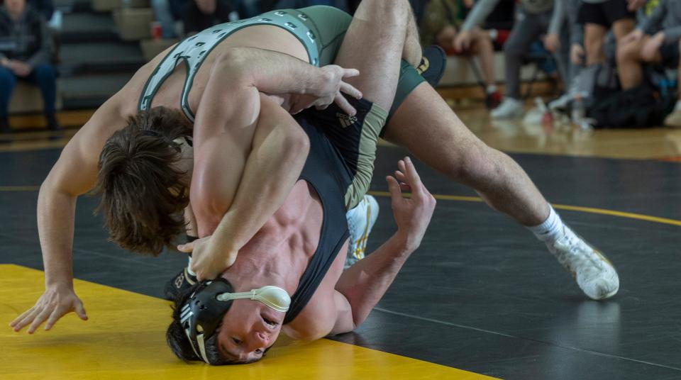 Delbarton's Vincent Lee (top) pins Southern's Collin French in 1:13 in the 190-pound bout. Delbarton won the match 48-12.