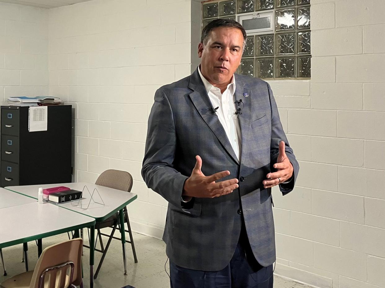 Columbus Mayor Andrew Ginther speaks to media following a "call-in" session hosted by the city's Office of Violence Prevention at the Church of Christ on Genessee Avenue.