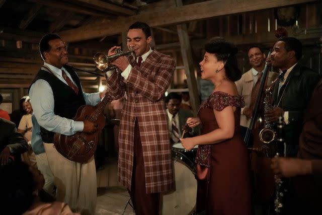 Jace Downs/NETFLIX Austin Scott (center) and Amirah Vann in 'A Jazzman's Blues,' 2022