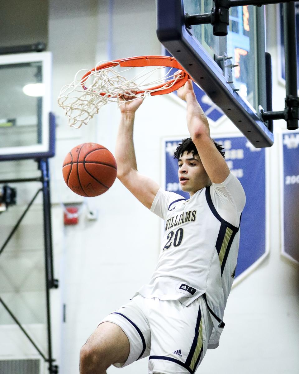 Archbishop Williams' Josh Campbell dunks during a game against Cardinal Spellman on Friday, Jan. 27, 2023.