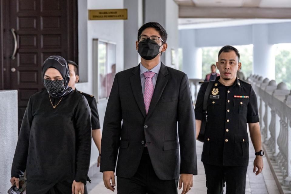 Bank Negara Malaysia analyst Adam Ariff Mohd Roslan is pictured at the Kuala Lumpur Court Complex September 21, 2023. — Picture by Firdaus Latif