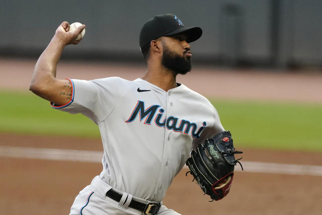 Cooper drives in 3 to lift Marlins over Braves in 10 innings