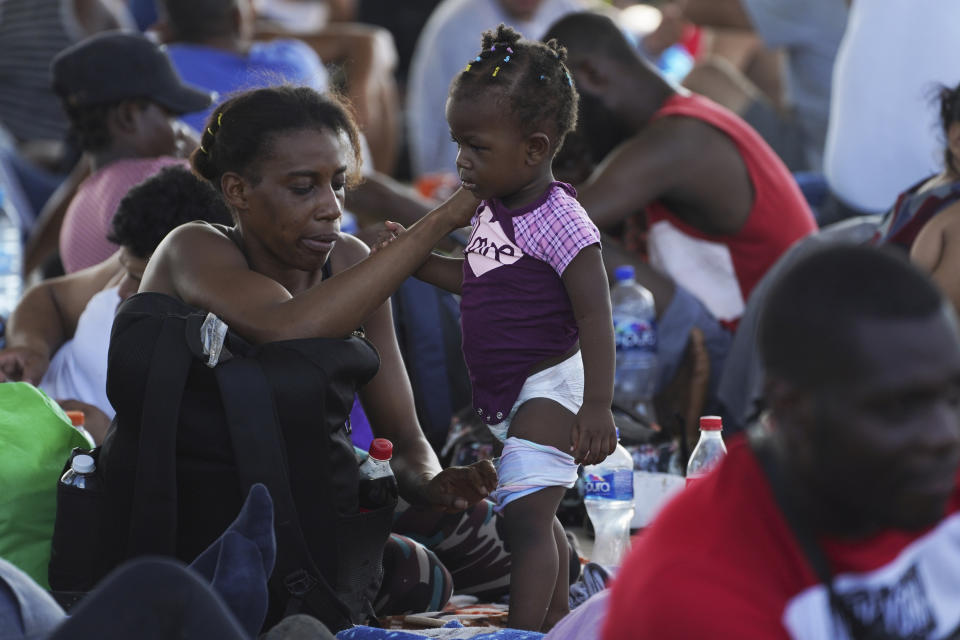 A caravan of migrants, mostly from Central America, heading north, stop to rest in the Alvaro Obregon community, Tapachula municipality, Chiapas state, Mexico, Saturday, Oct. 23, 2021. (AP Photo/Marco Ugarte)