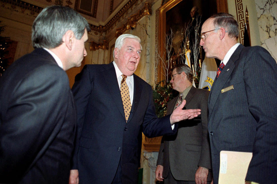 FILE — Rhode Island Gov. Lincoln Almond, center, speaks with U.S. Sen. Jack Reed, D-R.I., left, and Ronald Lambertson, regional director of the Fish and Wildlife Service, right, Wednesday, Dec. 22, 1999. Almond, the former two-term Republican governor of Rhode Island and longtime U.S. attorney in the state died Monday, Jan. 2, 2023, according to an obituary posted at the Avery-Storti Funeral Home and Crematory's website. (AP Photo/Peter Ventrone, File)
