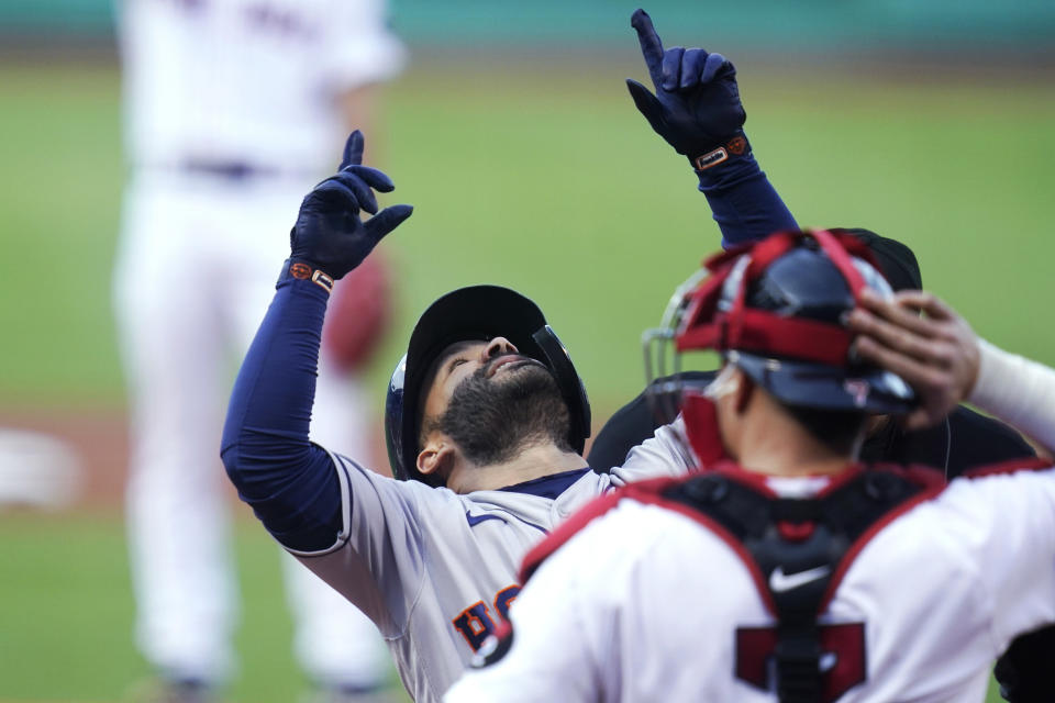 Houston Astros' Jose Altuve celebrates after his solo home run against the Boston Red Sox during the first inning of a baseball game at Fenway Park, Wednesday, May 18, 2022, in Boston. (AP Photo/Charles Krupa)