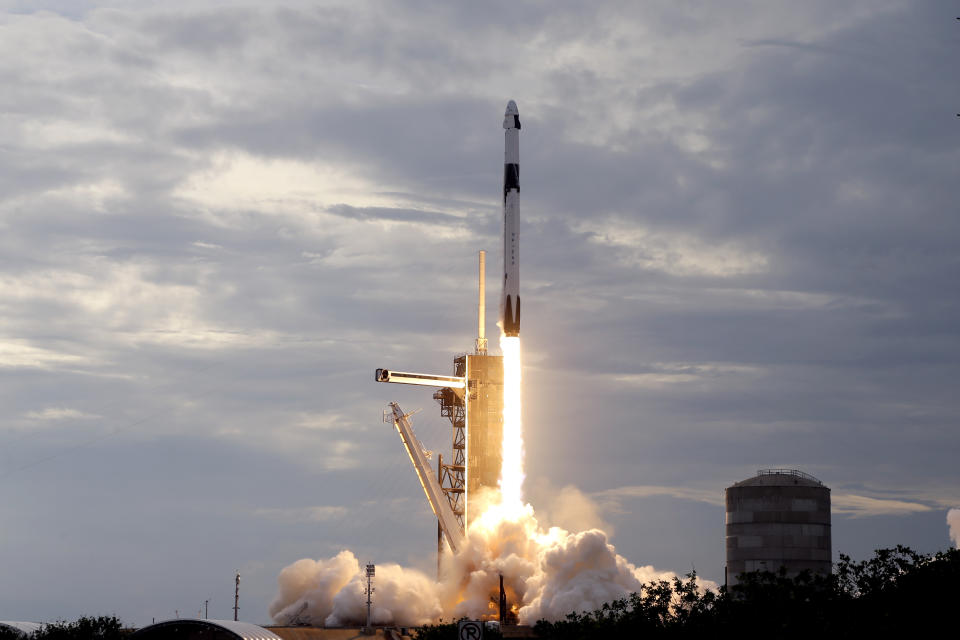 A SpaceX Falcon 9 rocket, with the Dragon capsule and a crew of four private astronauts, lifts off from pad 39A, at the Kennedy Space Center in Cape Canaveral, Fla., Sunday, May 21, 2023. (AP Photo/Terry Renna)