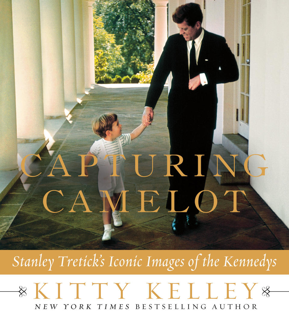 This cover image released by Thomas Dunne Books shows "Capturing Camelot: Stanley Tretick's Iconic Images of the Kennedys," by Kitty Kelley. The book features intimate images of John F. Kennedy by Kelley's close friend, photojournalist Stanley Tretick, who is known for his incredible access to the president and his family. (AP Photo/ Thomas Dunne Books)