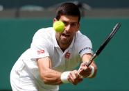 Serbia's Novak Djokovic in action against Great Britain's James Ward, June 27, 2016. REUTERS/Paul Childs