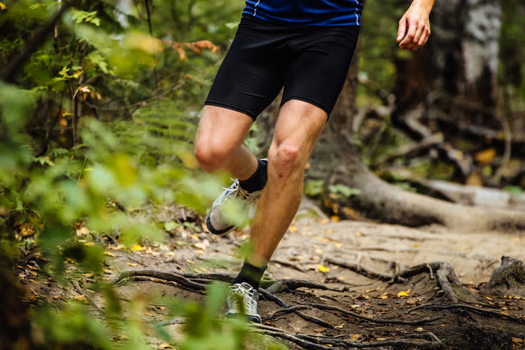 <span class="caption">It’s hard work, but running causes beneficial adaptations in the legs.</span> <span class="attribution"><a class="link " href="https://www.shutterstock.com/image-photo/running-man-marathon-runner-woods-over-481401628?src=o63GkpePtfVk4sOU86_Y0w-1-7" rel="nofollow noopener" target="_blank" data-ylk="slk:Shutterstock;elm:context_link;itc:0;sec:content-canvas">Shutterstock</a></span>