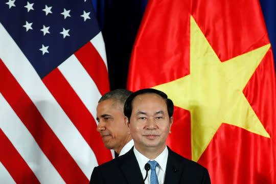<p>President Obama attends a press conference with Vietnam’s President Tran Dai Quang at the presidential palace compound in Hanoi on May 23, 2016. (Carlos Barria/Reuters) </p>