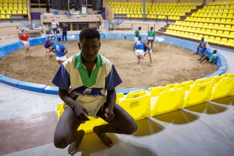 Cheik Ndaa, 13-year-old, poses for a picture during an interview with Reuters in Guarazoca