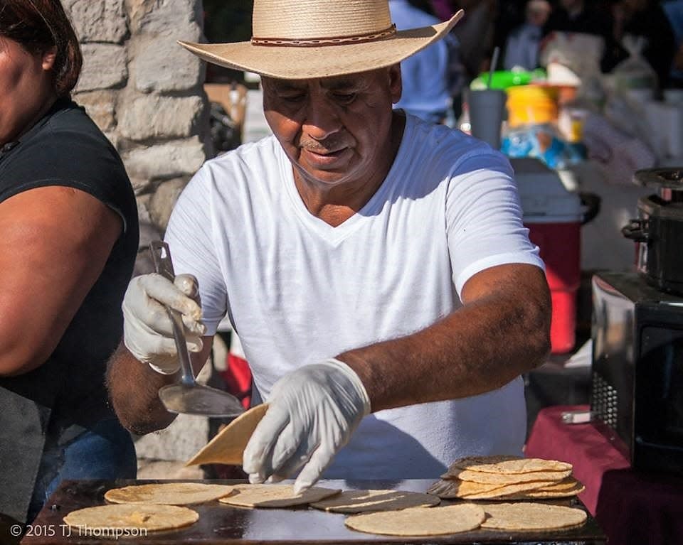 A cook griddles tortillas at the 2018 Fiesta Evansville.